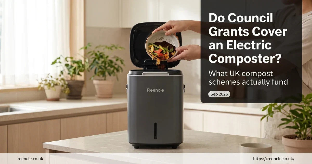 Dark grey Reencle composter on a pale stone counter beside a hand holding vegetable peelings.